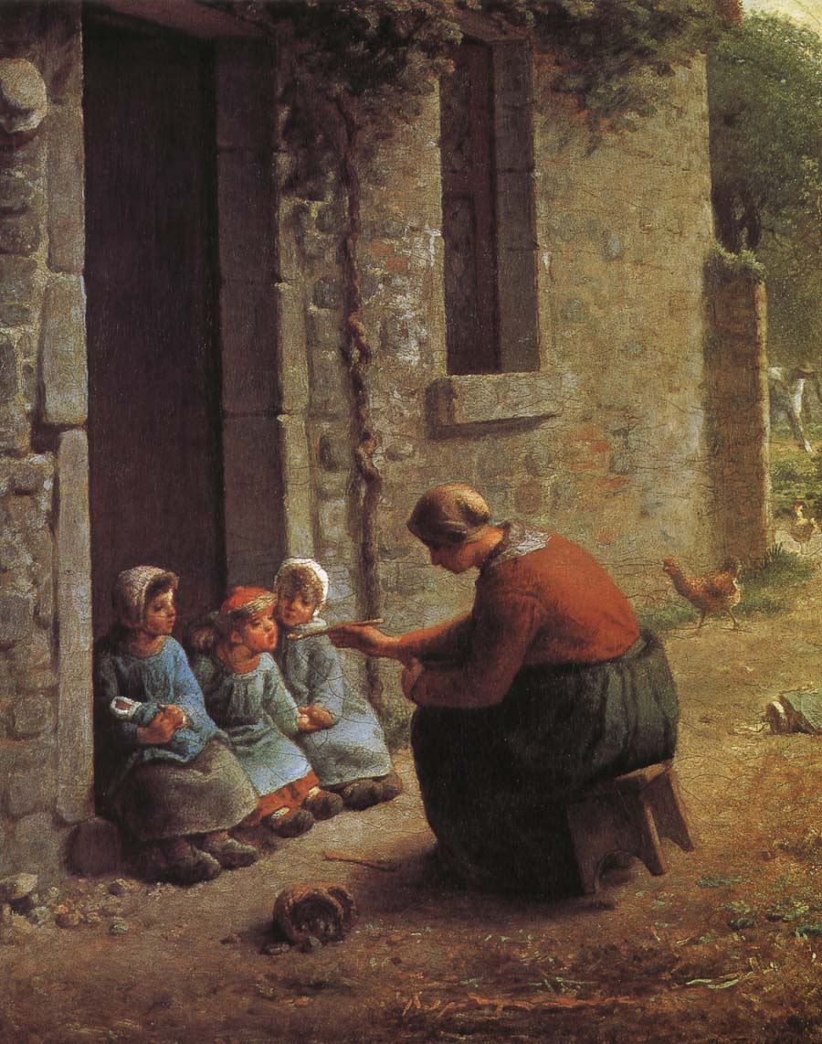 Woman feeding the children